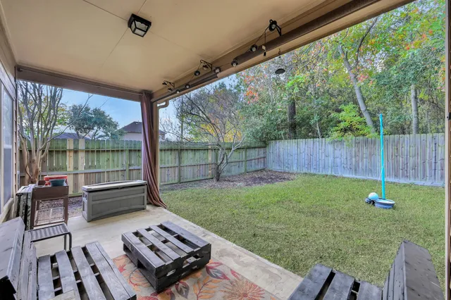 a view of a porch with furniture