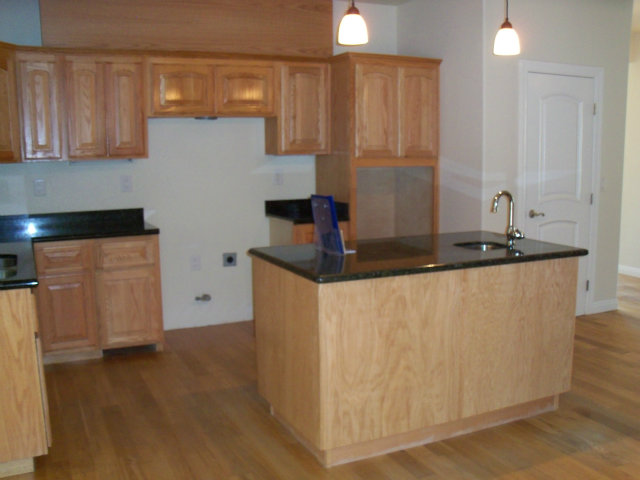 640 Lewis Road Watsonville, CA 95076 - Photo 8 of 13 a kitchen with granite countertop a sink and a stove