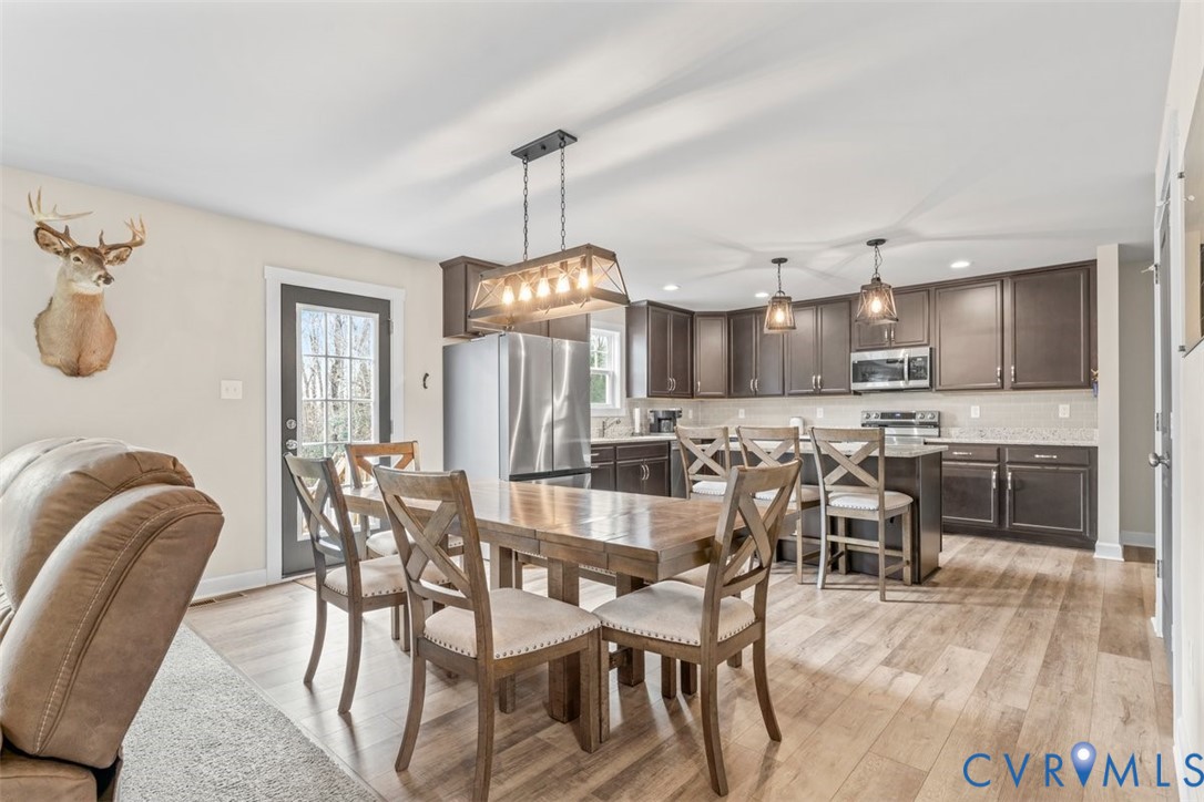 a view of a dining room with furniture