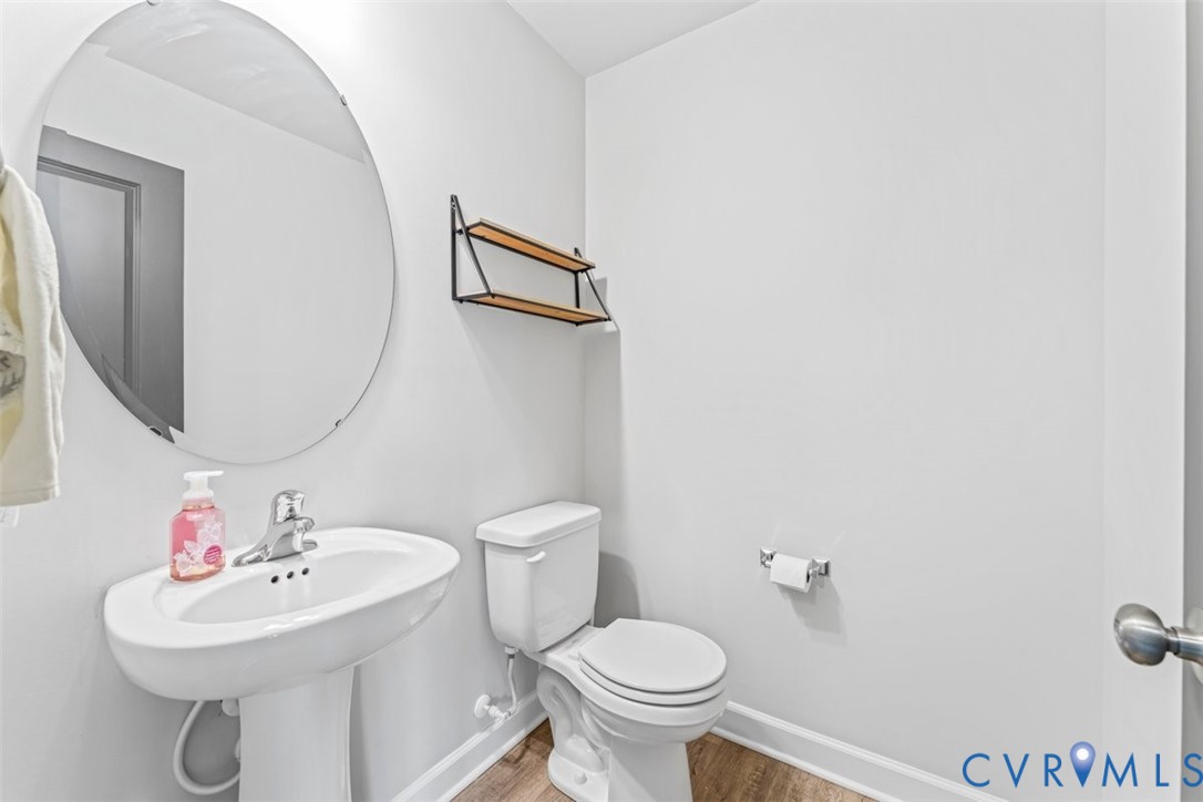 1463 Tutelo Road Quinton, VA 23141 - Photo 12 of 31 a bathroom with a sink mirror and toilet