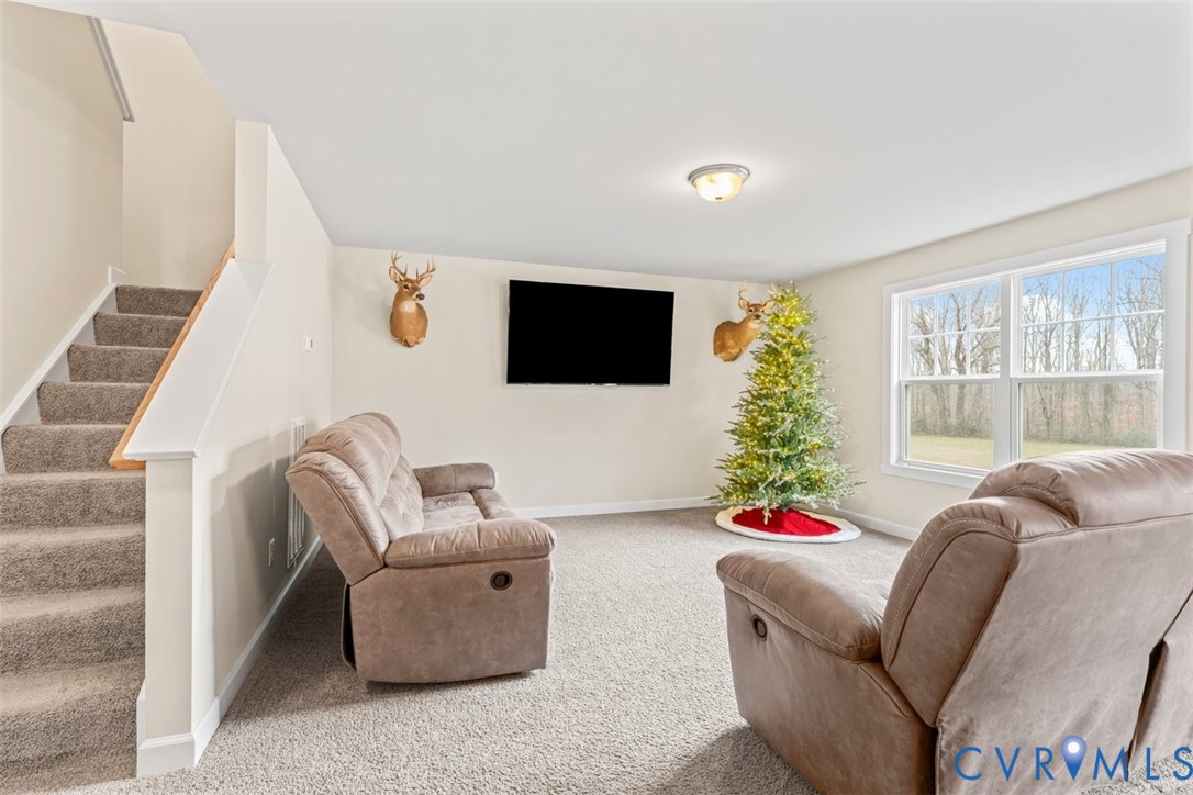 1463 Tutelo Road Quinton, VA 23141 - Photo 13 of 31 a living room with furniture and a flat screen tv