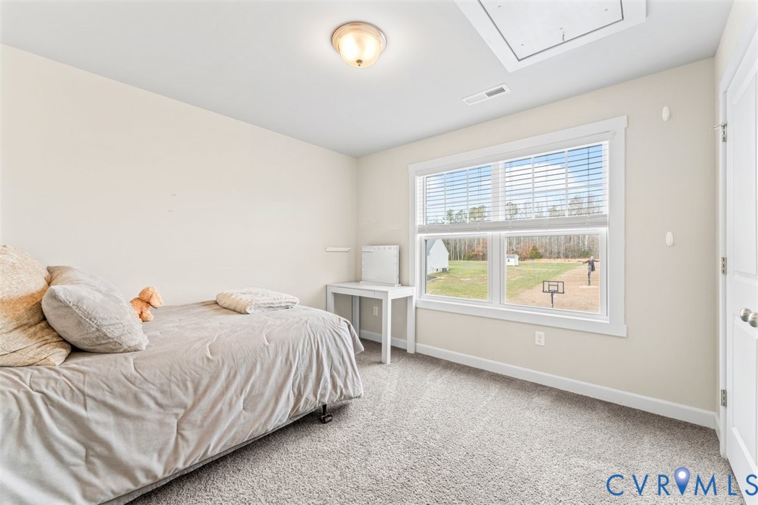 1463 Tutelo Road Quinton, VA 23141 - Photo 20 of 31 a bedroom with a bed and a window