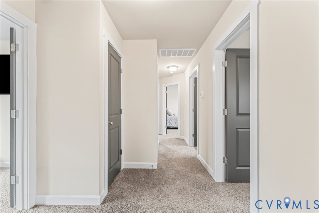 1463 Tutelo Road Quinton, VA 23141 - Photo 24 of 31 a view of a hallway with closet and mirror