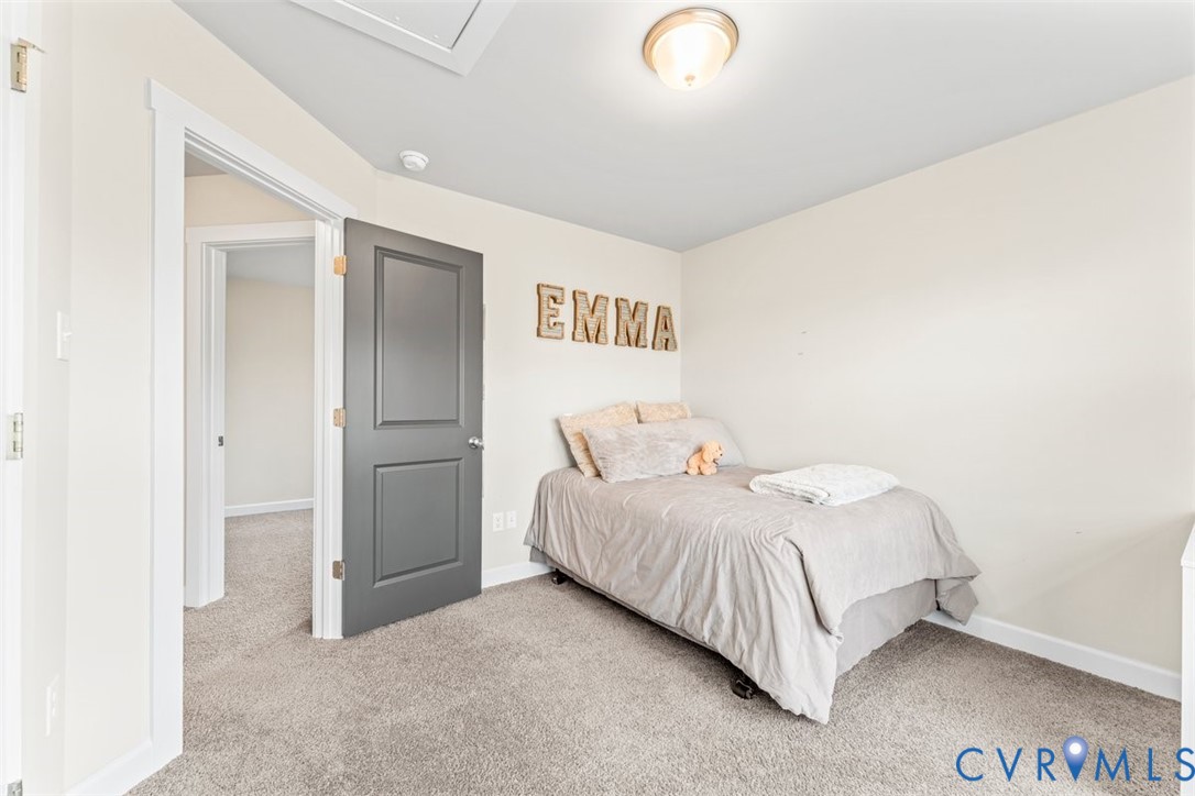 1463 Tutelo Road Quinton, VA 23141 - Photo 27 of 31 a bedroom with a bed and a cabinets