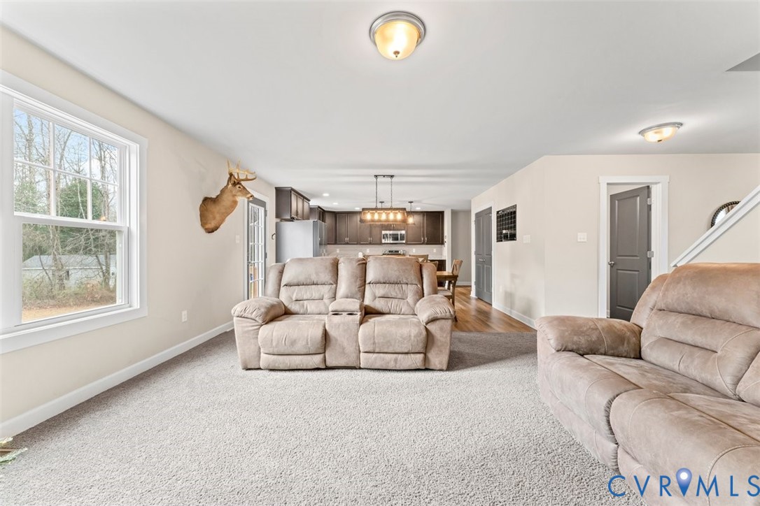 1463 Tutelo Road Quinton, VA 23141 - Photo 30 of 31 a living room with furniture and a window