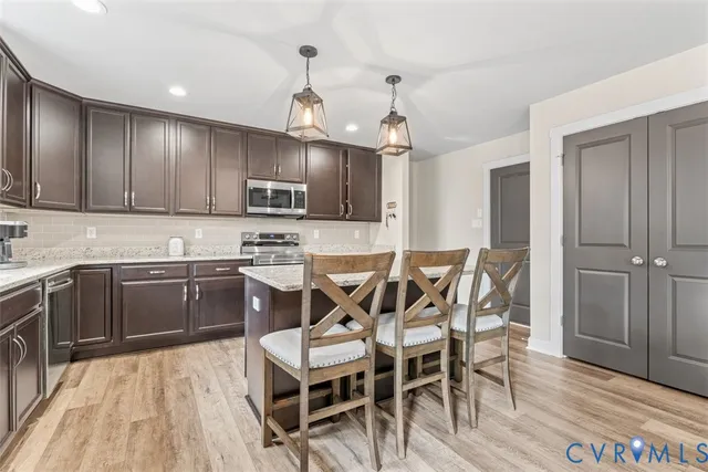 a view of a dining room with furniture