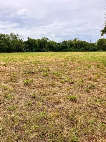 a view of lake with mountain in background