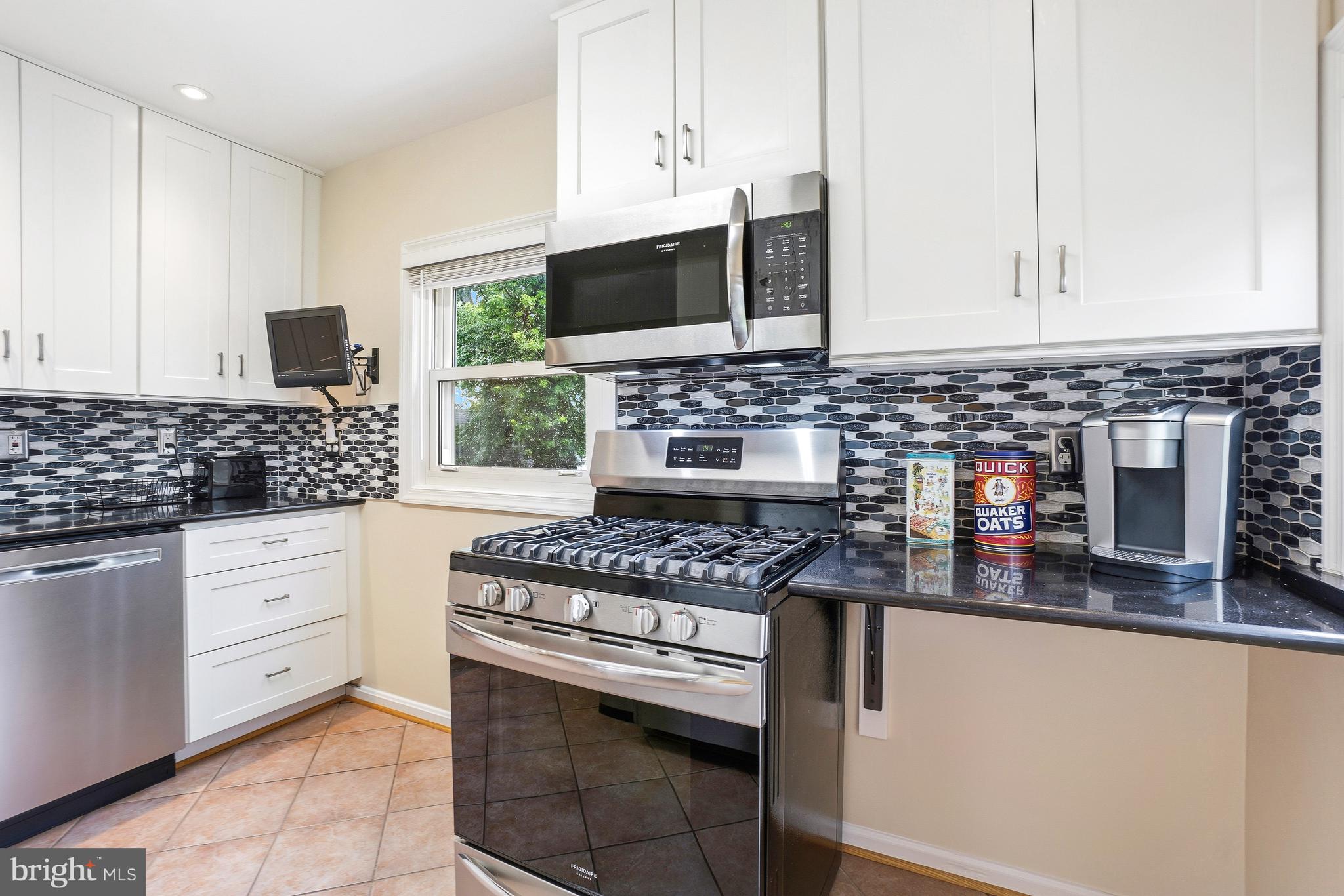 12311 Middle Road Silver Spring, MD 20906 - Photo 7 of 33 Renovated Kitchen with Gas Cooking