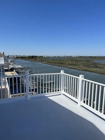 a view of a balcony with lake view