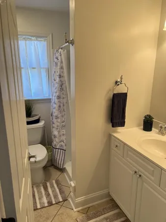 a bathroom with a toilet and a sink