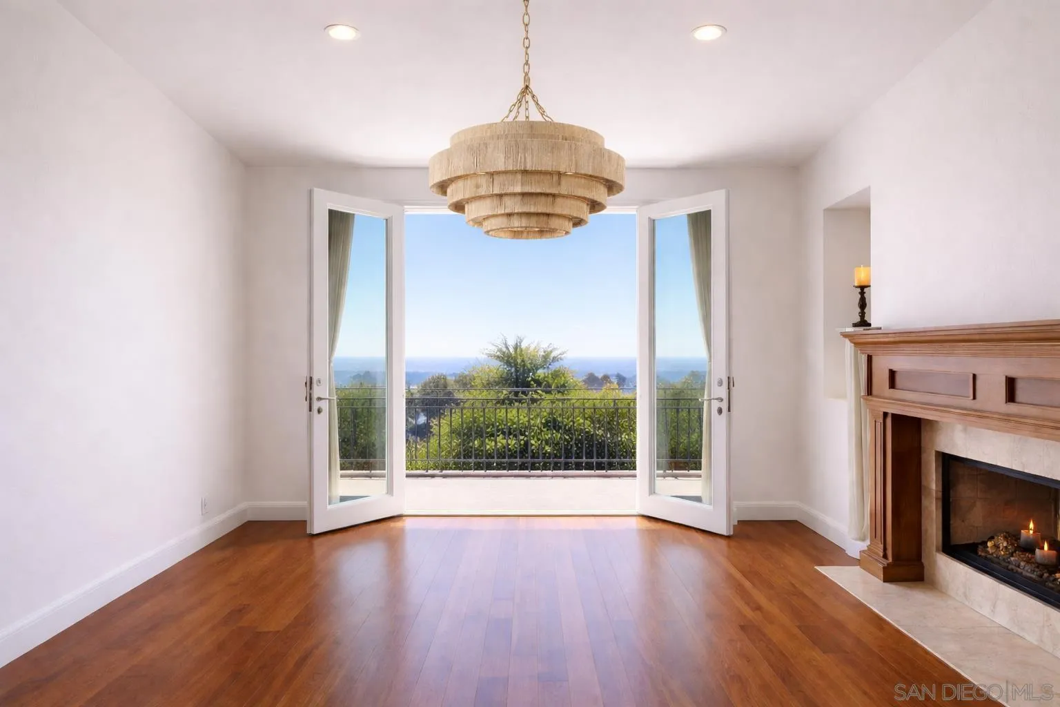 1690 Gascony Road Encinitas, CA 92024 - Photo 1 of 54 Digitally enhanced to show lighter paint color, different chandelier, and no furniture.