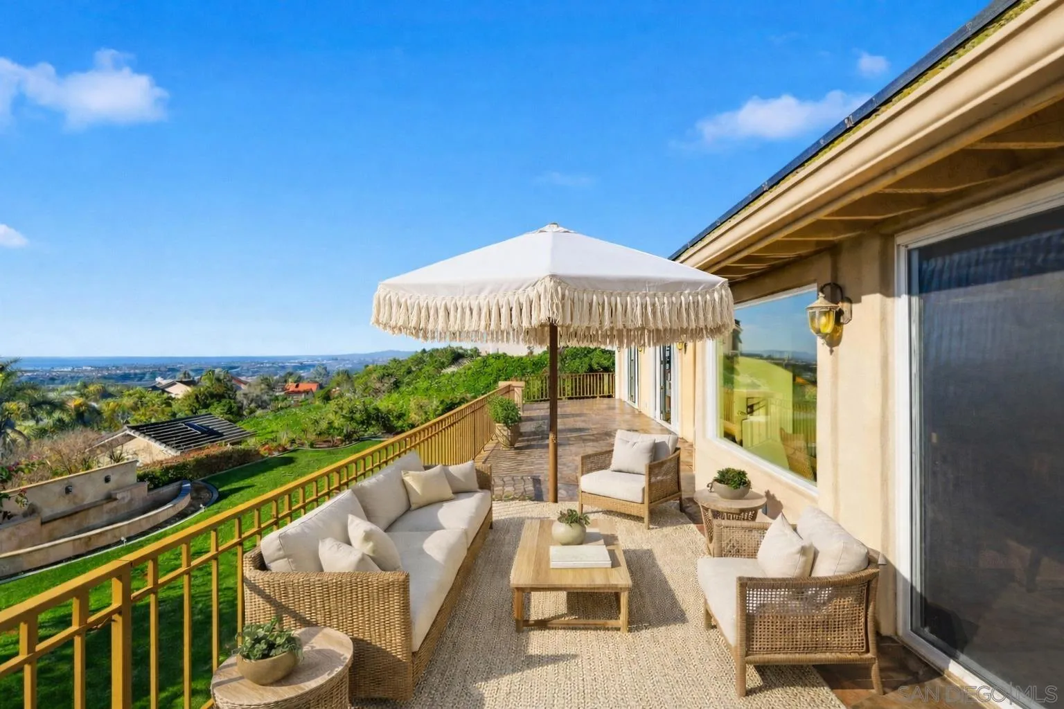 1690 Gascony Road Encinitas, CA 92024 - Photo 27 of 43 a view of balcony with furniture and garden