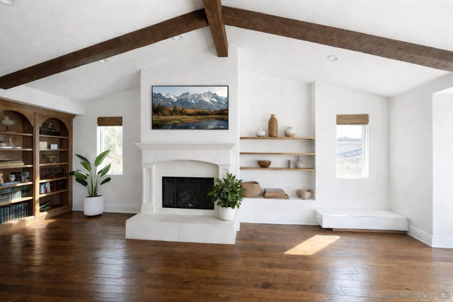 1690 Gascony Road Encinitas, CA 92024 - Photo 3 of 43 a living room with furniture and a fireplace