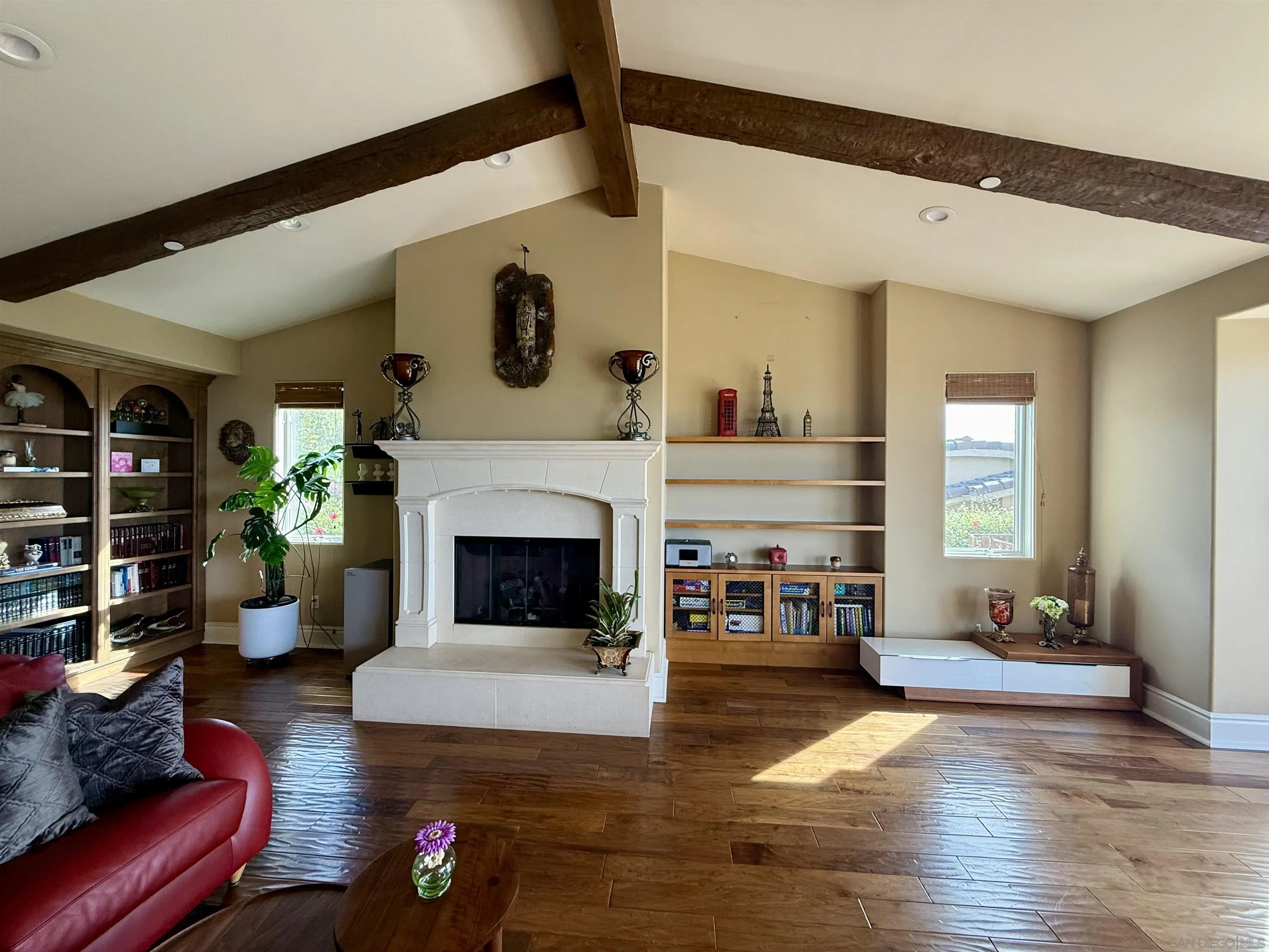 1690 Gascony Road Encinitas, CA 92024 - Photo 4 of 43 a living room with furniture and a fireplace