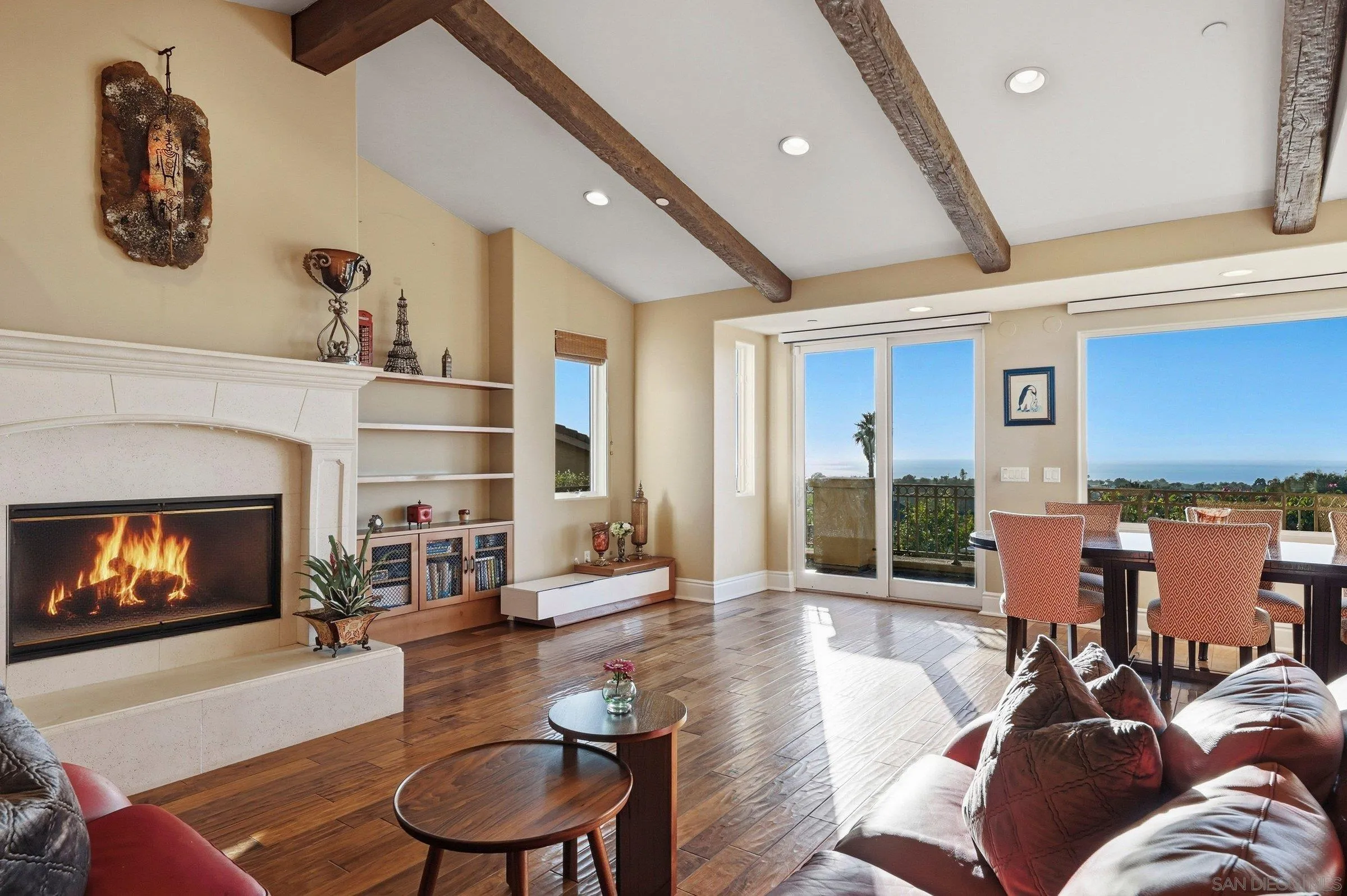 1690 Gascony Road Encinitas, CA 92024 - Photo 6 of 43 a living room with furniture and a fireplace