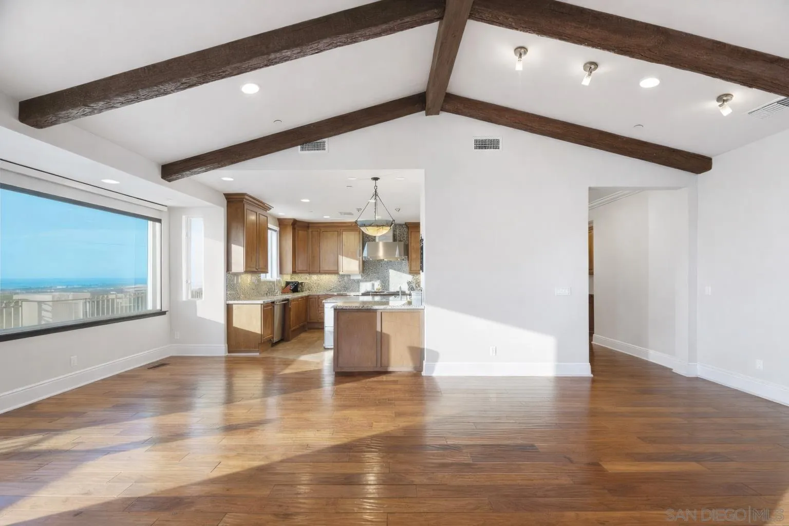 1690 Gascony Road Encinitas, CA 92024 - Photo 7 of 43 a view of kitchen with stainless steel appliances refrigerator oven and stove
