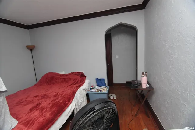 a bathroom with a sink vanity and toilet