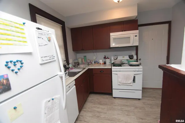 a bathroom with a sink a mirror and a shower