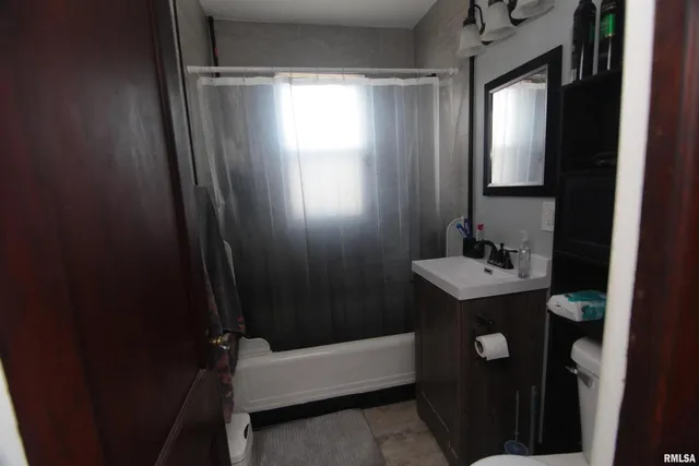 a brick building with a large window