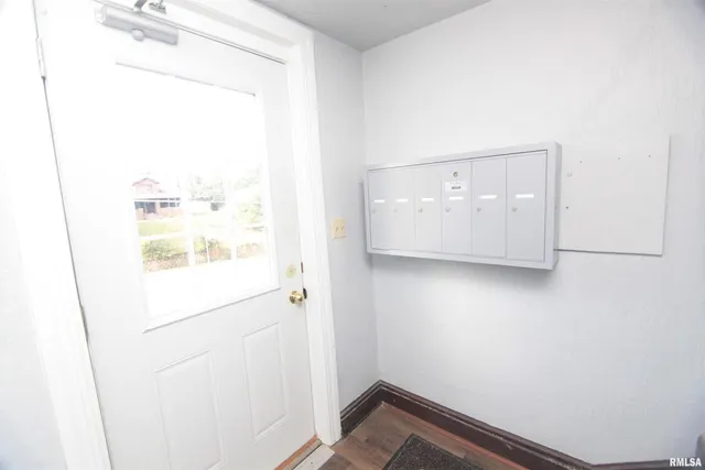 a view of a small space with racks on the wall