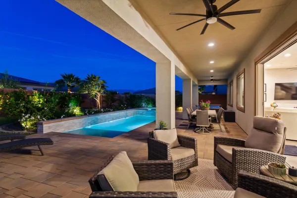 a living room with furniture and a yard