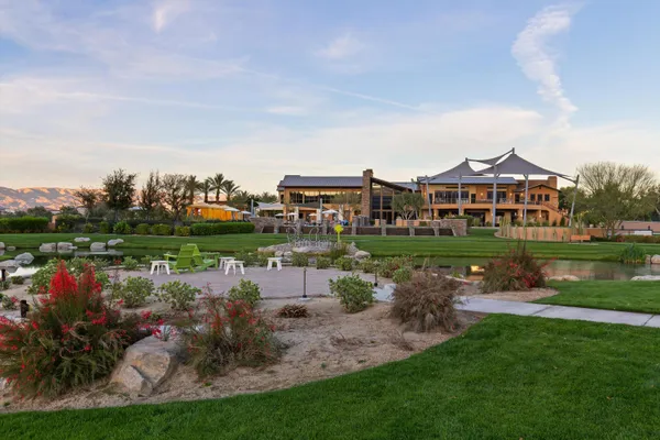 a view of a lake with a house in the background