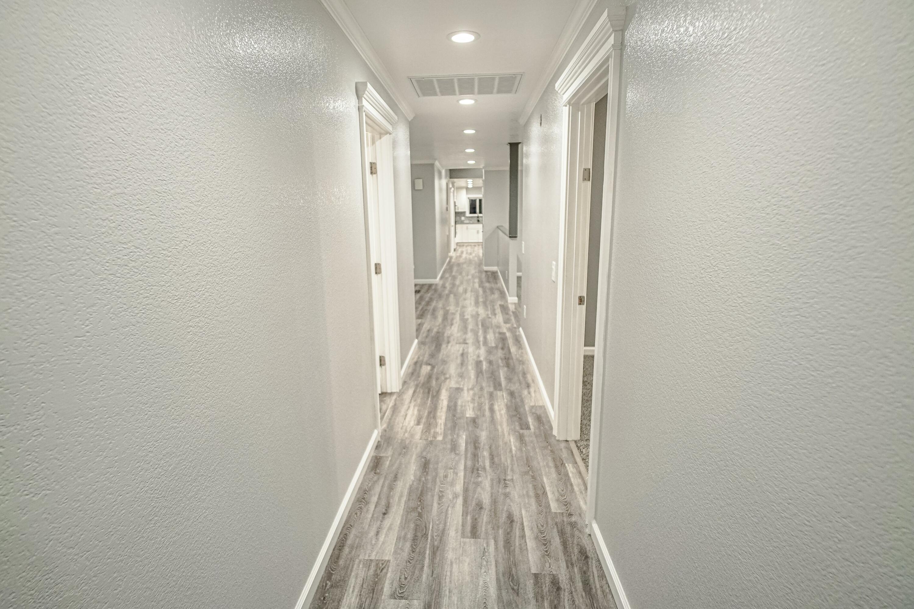16785 Billy Lane Red Bluff, CA 96080 - Photo 24 of 69 a view of a hallway with wooden floor