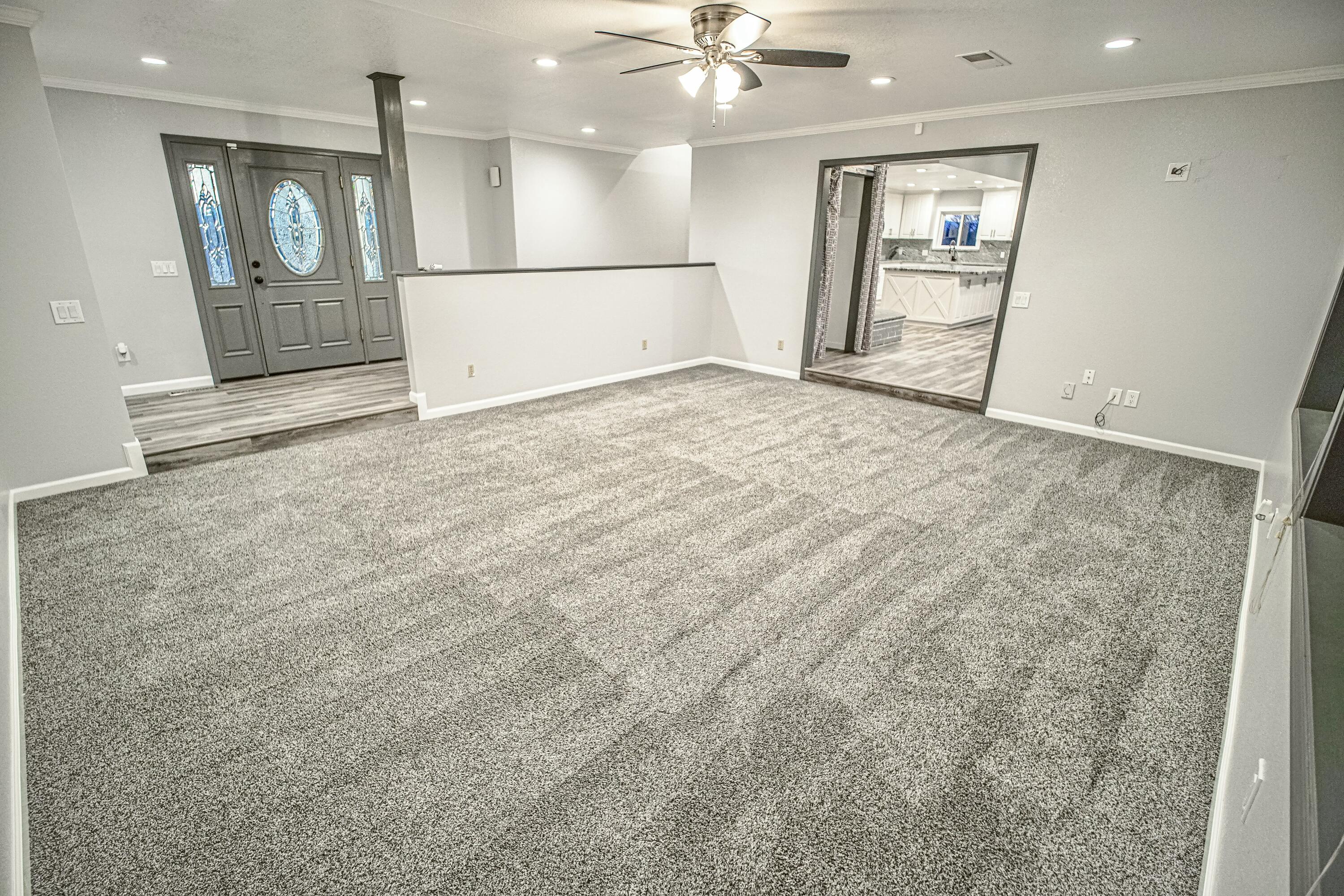 16785 Billy Lane Red Bluff, CA 96080 - Photo 6 of 69 wooden floor in an empty room with a mirror