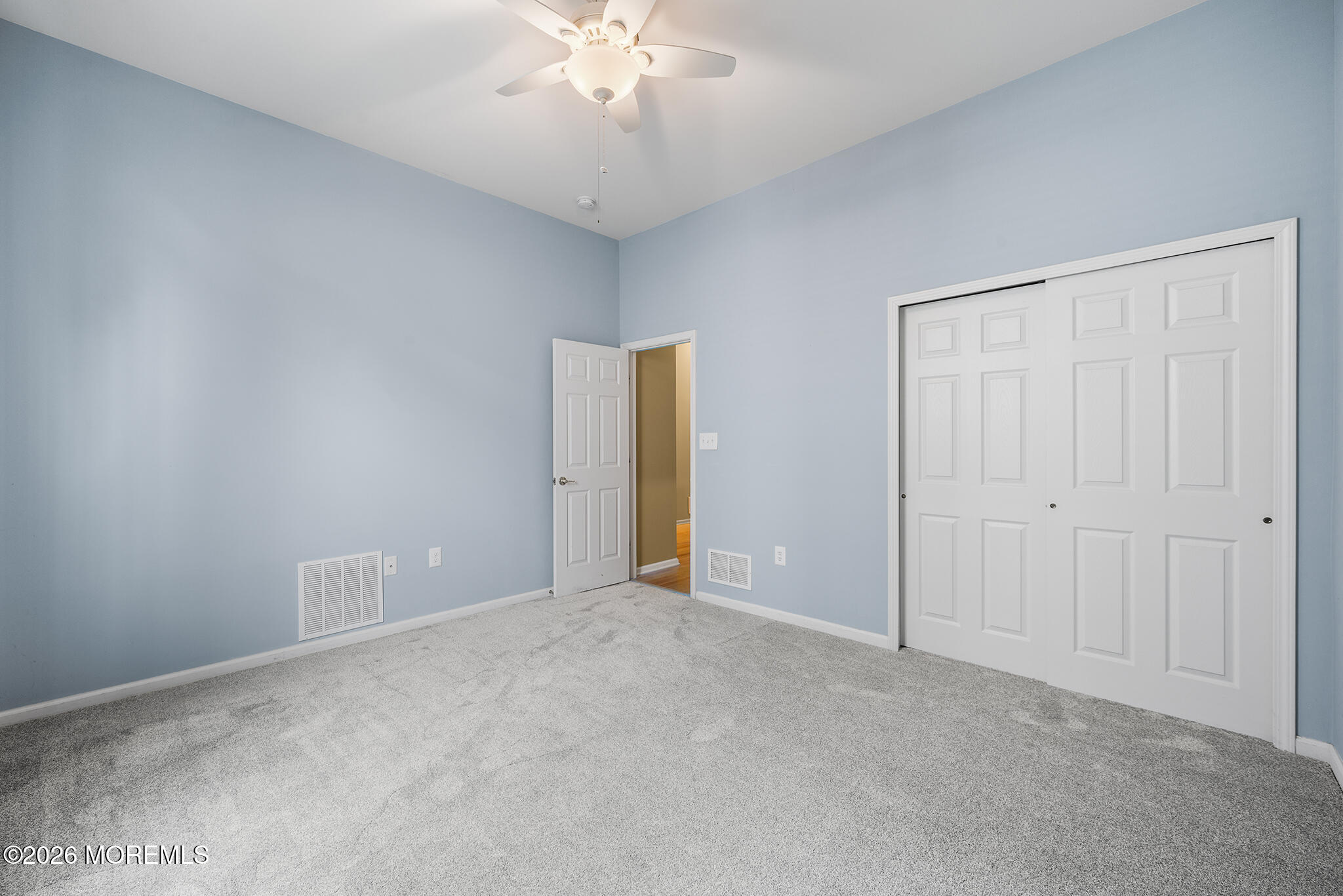 7 Brattleboro Road Jackson, NJ 08527 - Photo 26 of 62 a view of an empty room with a chandelier fan