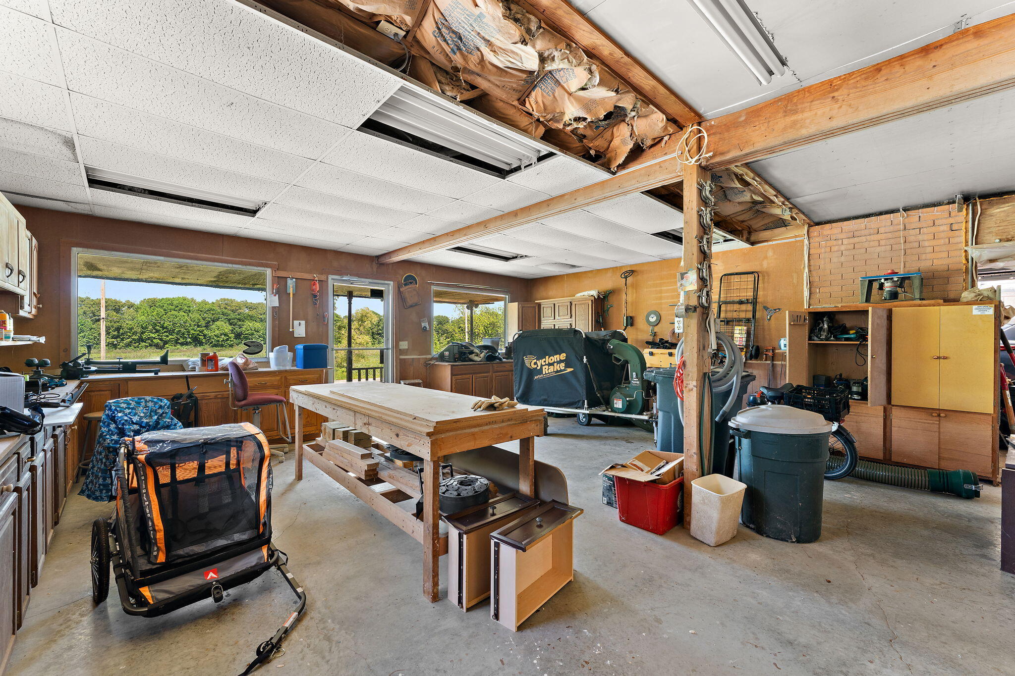 138 McClung Road La Porte, IN 46350 - Photo 26 of 50 a view of a patio with table and chairs next to a yard