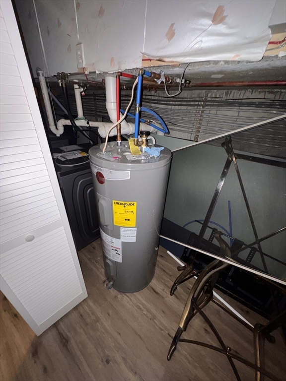 100 Lawn Street, Unit 100 Boston, MA 02120 - Photo 25 of 40 a utility room with dryer and washer