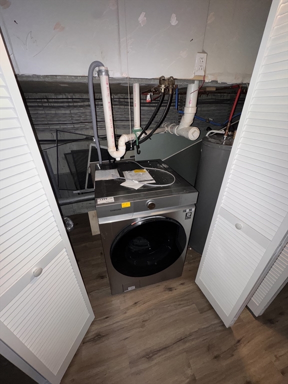 100 Lawn Street, Unit 100 Boston, MA 02120 - Photo 26 of 40 a view of a livingroom with furniture and staircase