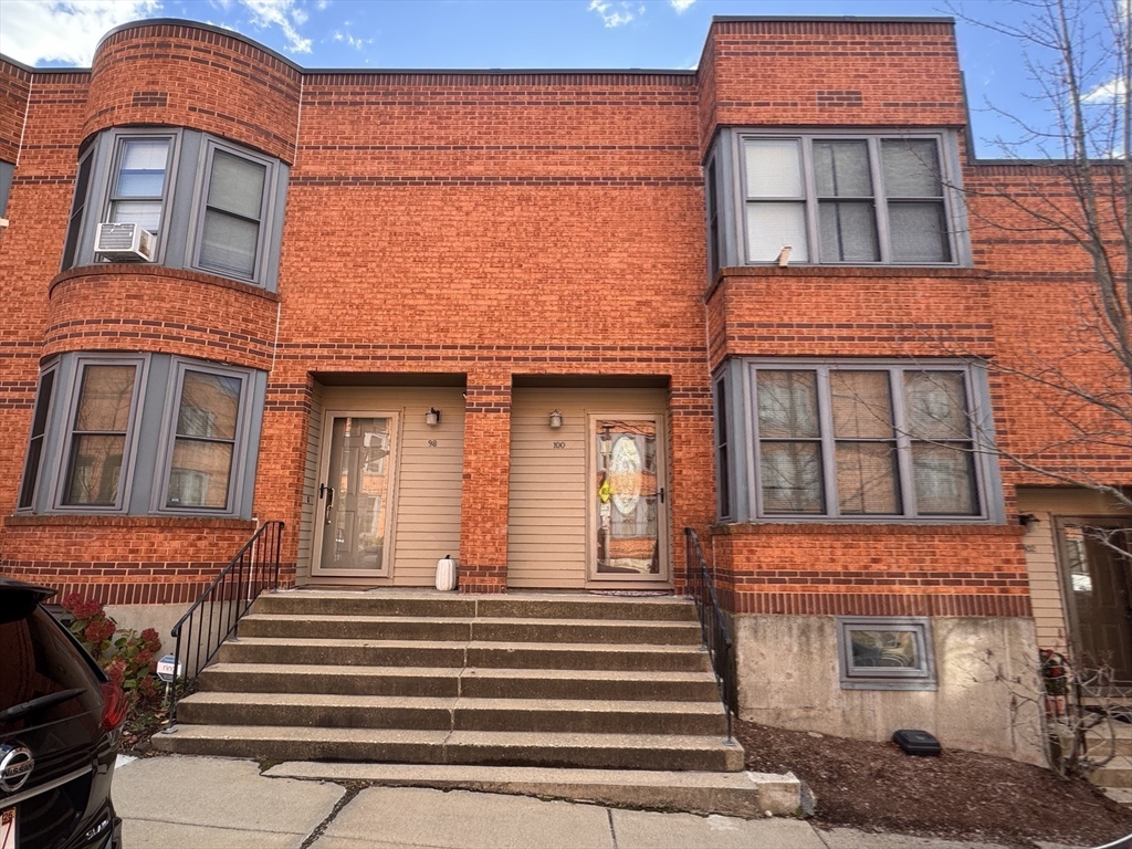 100 Lawn Street, Unit 100 Boston, MA 02120 - Photo 28 of 40 a building view with a outdoor space