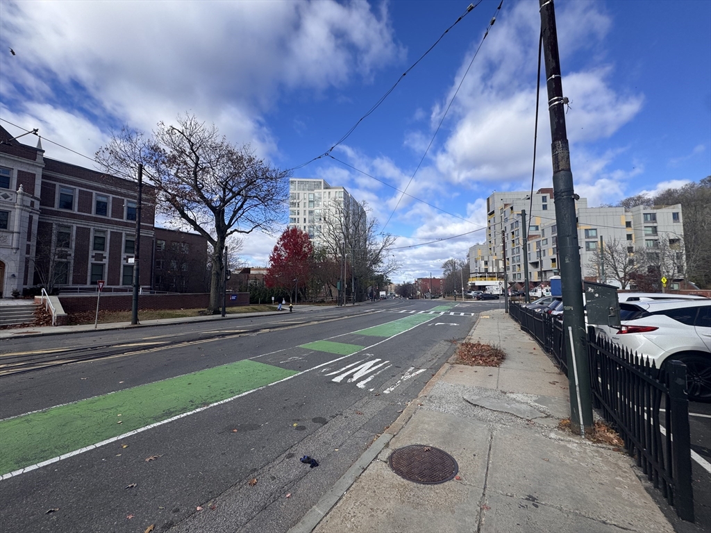 100 Lawn Street, Unit 100 Boston, MA 02120 - Photo 37 of 40 a view of a city street lined with buildings