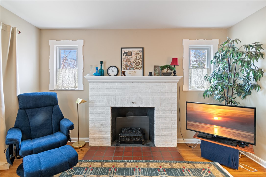 465 Laurelton Road Irondequoit, NY 14609 - Photo 16 of 43 A fireplace always gives a room that COZY feeling!
