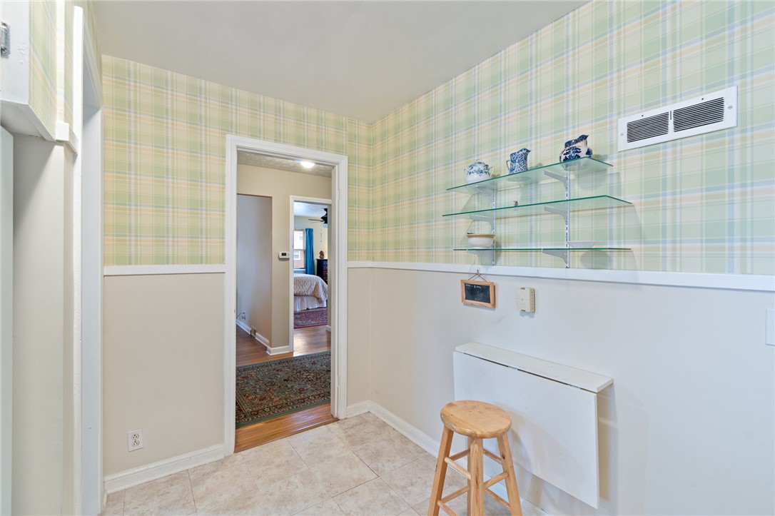 465 Laurelton Road Irondequoit, NY 14609 - Photo 20 of 43 The kitchen to the hall- the hall has THREE floor
