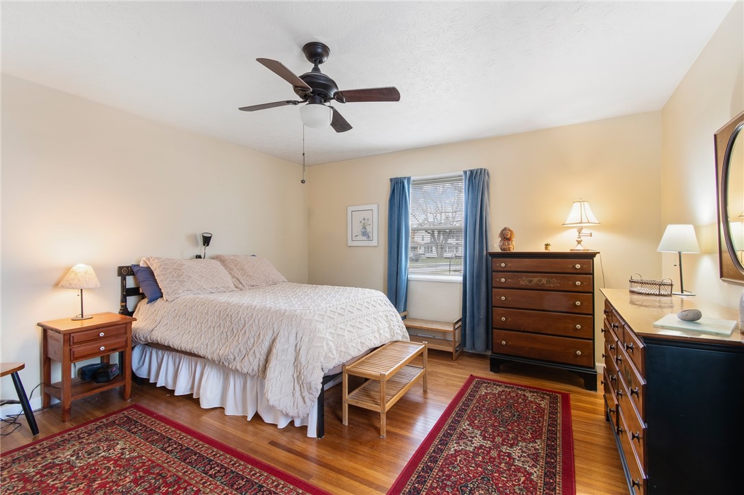 465 Laurelton Road Irondequoit, NY 14609 - Photo 25 of 43 HUGE BEDROOM with exceptional REAL HARDWOOD floori