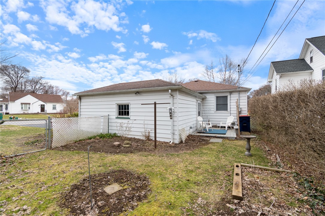 465 Laurelton Road Irondequoit, NY 14609 - Photo 6 of 43 The rear fenced yard with a private deck area- hav