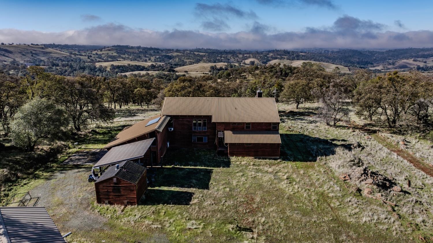 11151 Ridge Road Sutter Creek, CA 95685 - Photo 4 of 61 a view of a terrace with a mountain