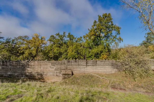 a view of a yard with a mountain