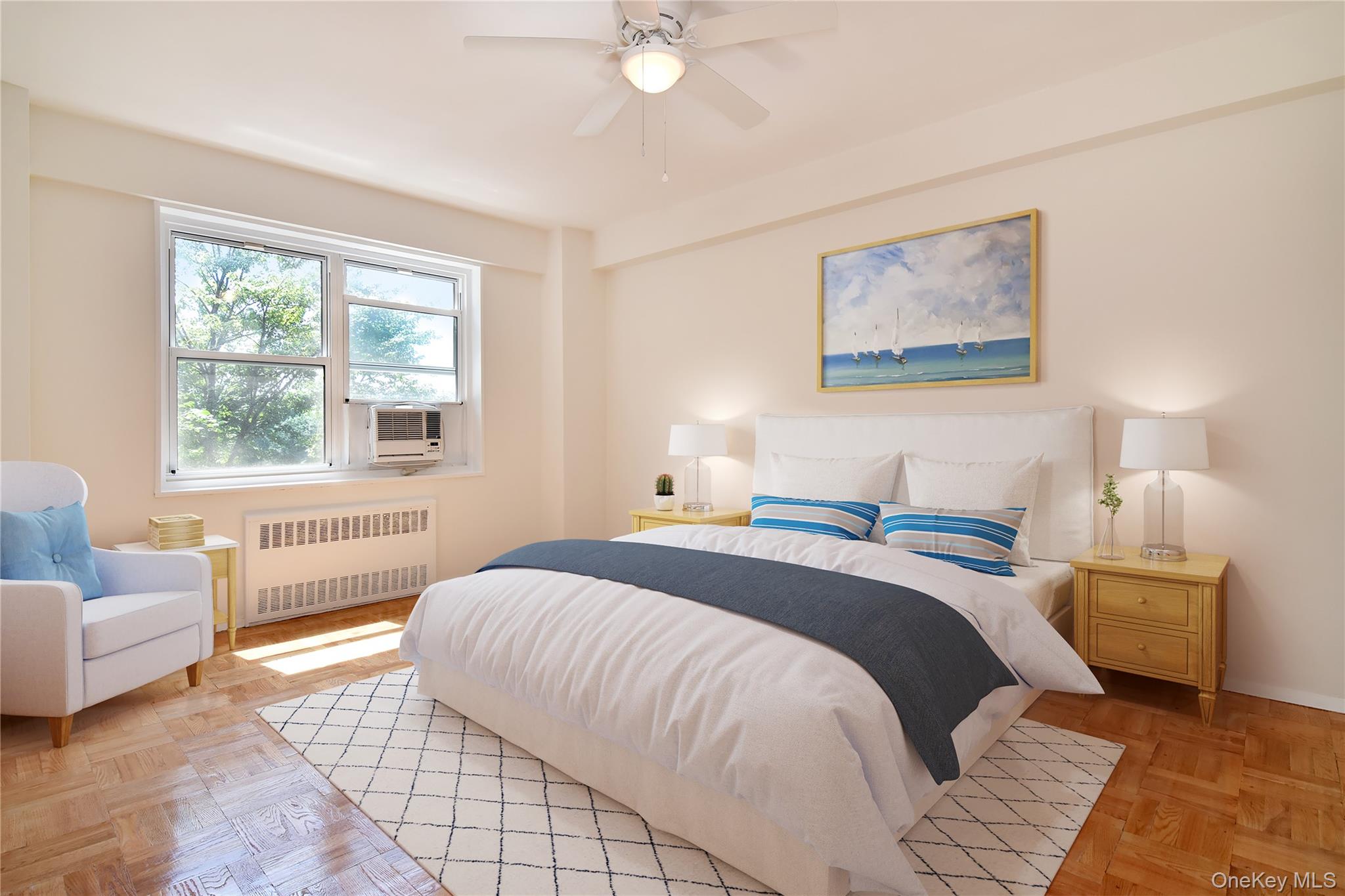 900 Palmer Road, Unit 7L Bronxville, NY 10708 - Photo 11 of 21 a bedroom with a bed and a couch