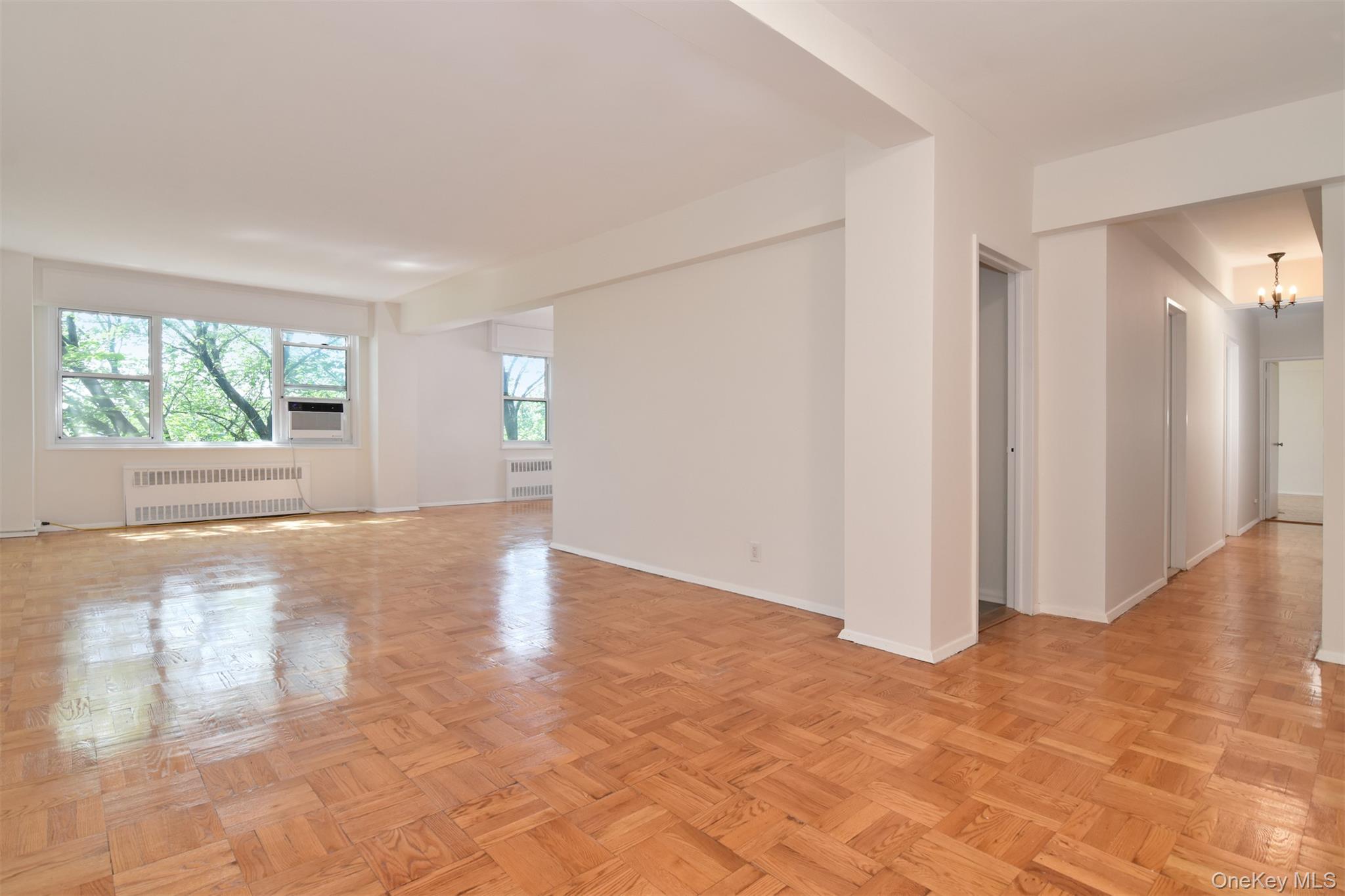900 Palmer Road, Unit 7L Bronxville, NY 10708 - Photo 2 of 21 an empty room with windows and closet