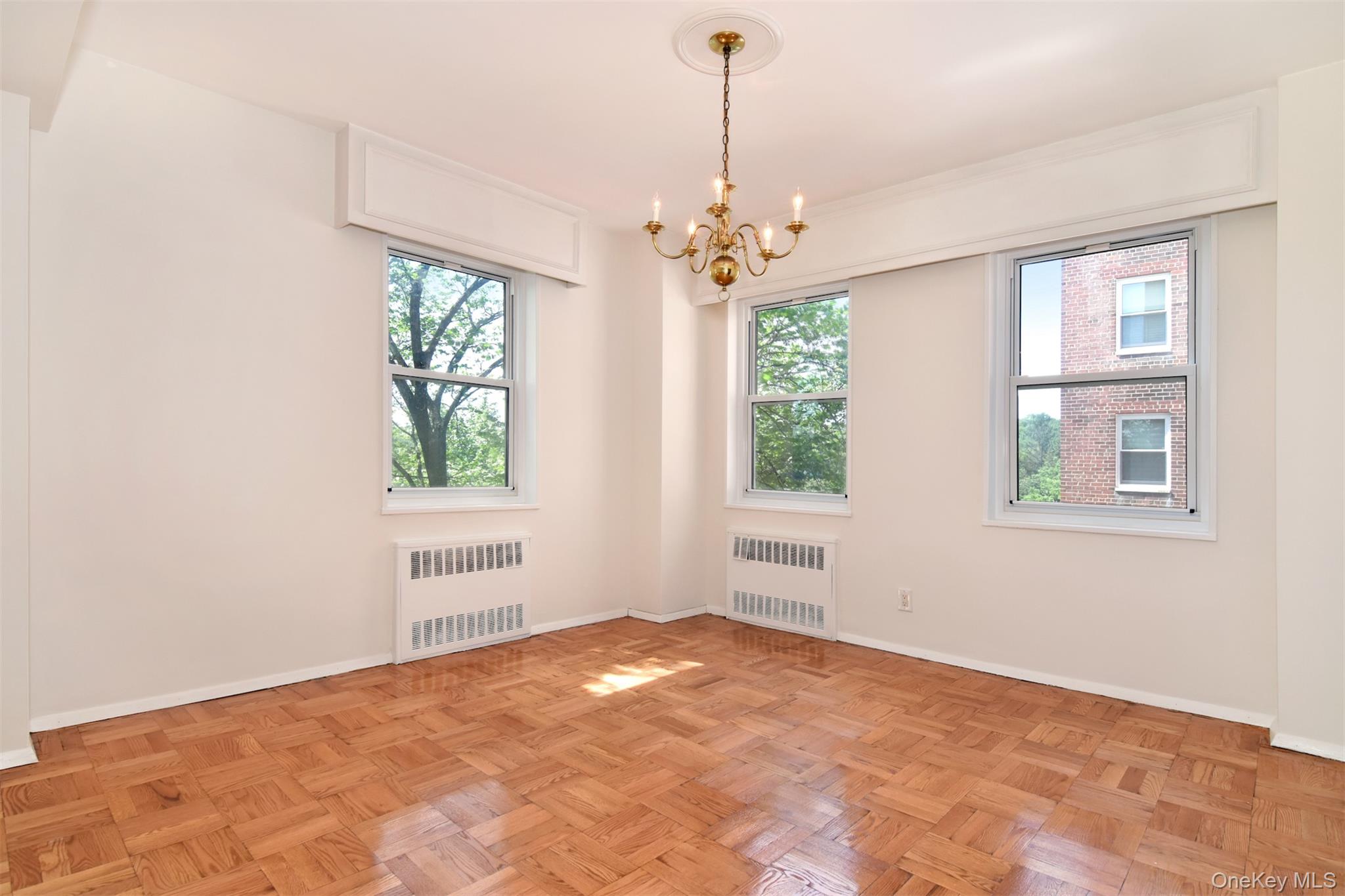 900 Palmer Road, Unit 7L Bronxville, NY 10708 - Photo 6 of 21 a view of an empty room with a window