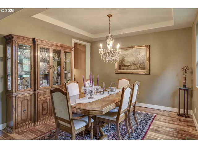 a living room with furniture a window and a table