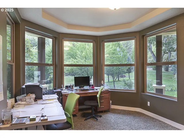 a workspace with furniture and window