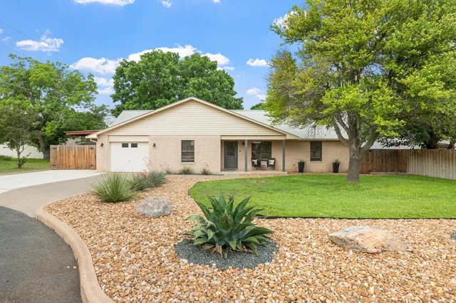 a view of a house with a patio