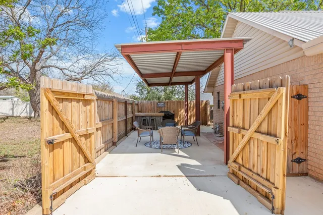 a table and chairs in the roof deck