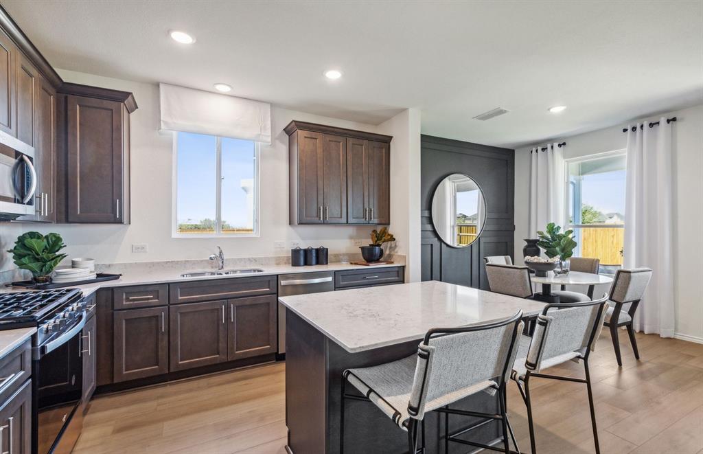 1136 Loch Way Princeton, TX 75407 - Photo 5 of 17 Large island overlooking dining areas *model representation
