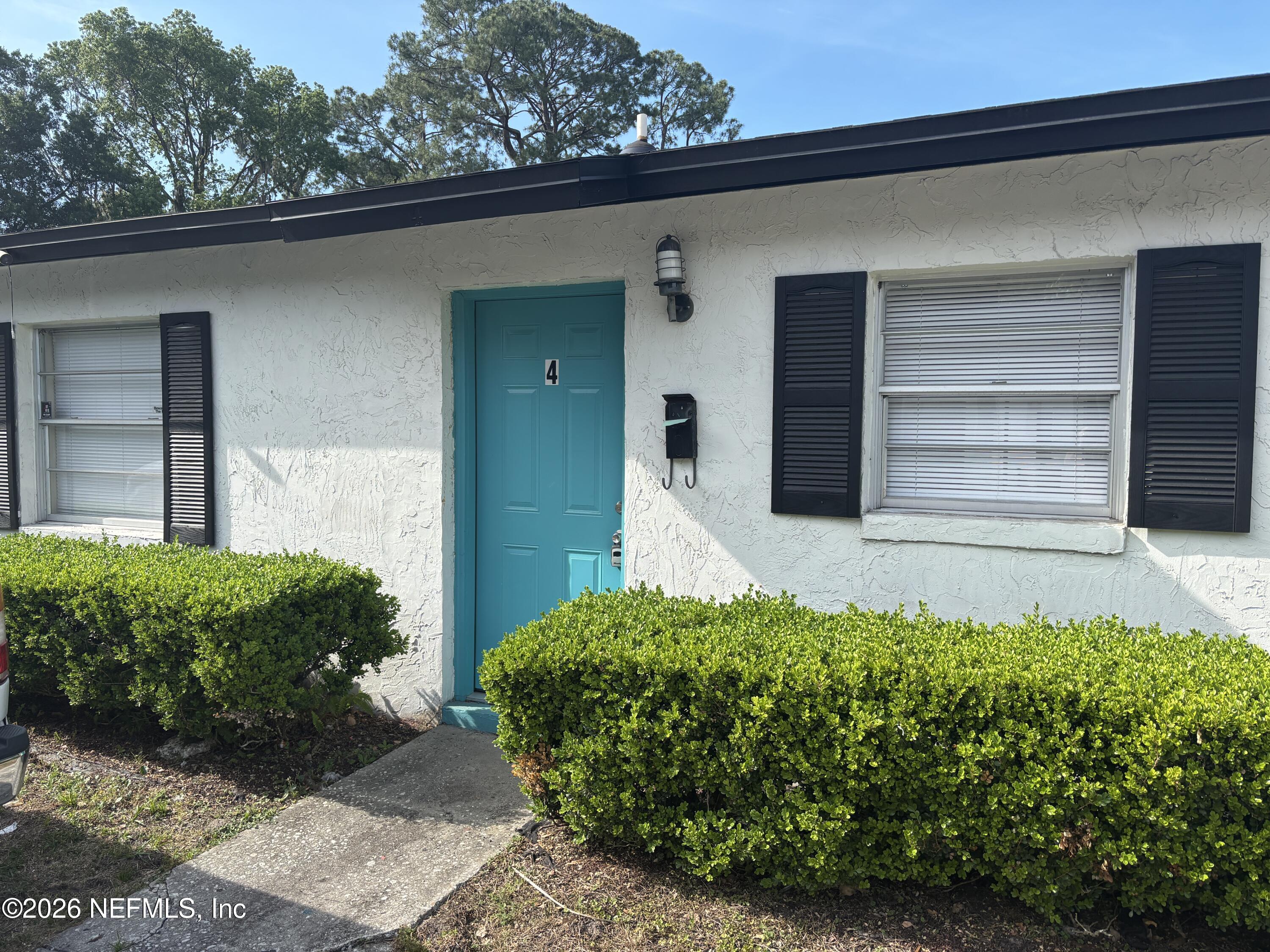 1515 Pullen Road, Unit 4 Jacksonville, FL 32216 - Photo 1 of 14 a front view of a house