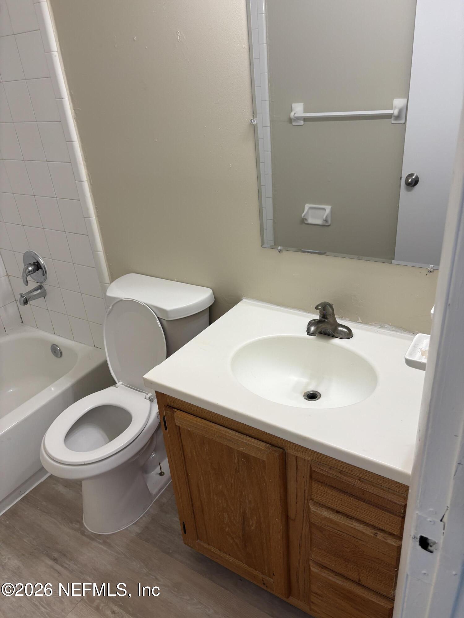1515 Pullen Road, Unit 4 Jacksonville, FL 32216 - Photo 10 of 14 a bathroom with a sink and a toilet